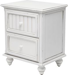 a white nightstand with two drawers on each side