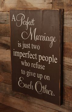 a sign that says perfect marriage is just two imperfect people who refuse to give up on each other