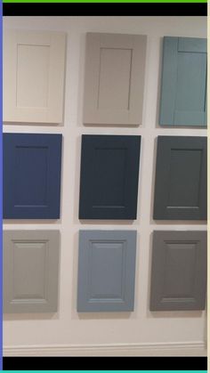 several different colors of cabinets on the wall