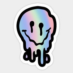 a rainbow colored sticker with a smiley face on it's head and eyes