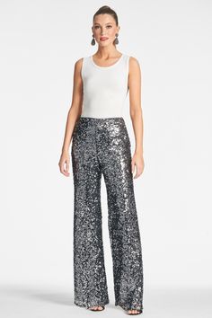 How can you say no to a shimmering and chic sequin trouser? Before you think that you can only dress these up, remember fashion is a feeling and if you want to wear these with a sweatshirt you can! This pant is the party, they upgrade every look and they are absolutely timeless. Plus, there is hidden stretch elastic at the back, so they are comfortable too!Details:Model is 5'10.5" wearing size 232" InseamSide ZipperScatter Sequins95% Polyester - 5% Spandex ImportedStyle #F233P05-021 Sachin Babi, Sequin Pants, Special Occasion Outfits, Bootcut Pants, Gunmetal Grey, Fabric Tape, Stretch Pants, Wide Leg Trousers, How Can