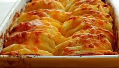 a casserole dish filled with cheesy bread