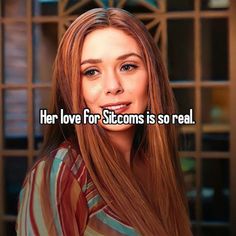 a woman with long red hair and the words her love for stroms is so real