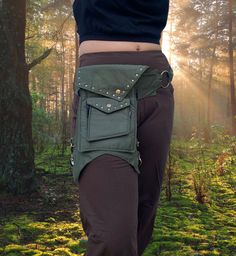 Versatile Pocket Belt & Thigh Bag – Secure and Stylish Utility Fanny Pack for Festivals, Hikes, and Daily Adventures Stay hands-free and organized with our Versatile Pocket Belt, designed for comfort and convenience during all your outdoor activities. Whether you're attending a festival, hiking, or exploring a Ren Faire, this adjustable fanny pack and thigh belt will keep your essentials close and secure. Crafted with durable materials and thoughtful design, this utility belt offers practical st Thigh Belt, Thigh Bag, Fantasy Clothes, Festival Belt, Leg Straps, Utility Belt, Pocket Belt, Hip Bag, Fantasy Clothing