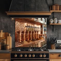 a kitchen scene with focus on the stove top and spice jars hanging from the wall