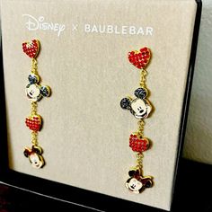 Add Some Magic To Your Jewelry Collection With These Disney X Baublebar Earrings Featuring Mickey And Minnie Mouse. The Dazzling Rhinestone Heart-Shaped Earrings Are Perfect For Any Fan Of The Iconic Couple. The Earrings Are Brand New And Never Worn, Making Them A Great Addition To Any Collection. The Earrings Are Designed By Baublebar And Officially Licensed By Disney, Ensuring Their Quality And Authenticity. As A Part Of The Disneyana Franchise, These Earrings Are A Must-Have For Collectors. S Minnie Mouse Outline, Ballerina Earrings, Minnie Mouse Red, Apple Earrings, Minnie Mouse Earrings, Huggie Earrings Silver, Baublebar Earrings, Enamel Stud Earrings, Ghost Earrings