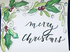 a watercolor christmas card with holly leaves and red berries on the bottom, merry christmas written in black ink