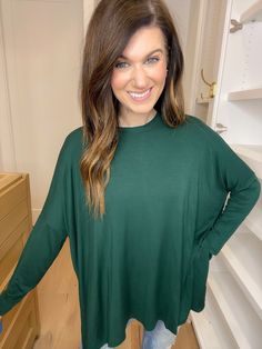 We love basics and this one instantly became one of our faves. It reminds us of a Piko top but with an updated fit and comfier fabric. This can be dressed up or down with little to no effort. You can wear it for travel or the office. It’s a top that does it all. This is long enough for most to pair with leggings. Top measures 26" in length. Bust measures 32" from seam to seam. Measurements taken on a small. Fabric has lots of stretch. This has a generous, oversized fit. Size down if in between s Skirt Extender, Deodorant Stains, Oversized Fits, The Office, Dress Up, Leggings, Boutique, Fabric, Travel