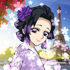 a woman in front of the eiffel tower with purple flowers on her hair