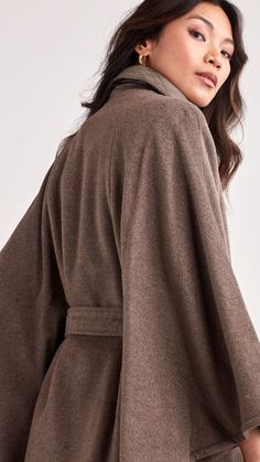 The Ellen Tracy Belted Wool Cape is effortlessly glamorous outerwear that will keep you warm, and help you stand out from the pack. This wool cape/coat features a belted tie to give your waistline extra definition. It’s a modern update on a timeless design, and it will fit right in with your wardrobe. Belted Cape Coat, Belted Cape, Wool Cape Coat, Fall Forward, Country Fashion, Wool Cape, Cape Coat, Ellen Tracy, The Pack