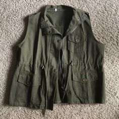 Stylish Green Vest With Pocket. Zipper Close With Buttons. Never Worn. Cheap 90s Fitted Vest, Casual Green Vest With Pockets, Green Cargo Vest, Spring Military Vest With Pockets, Vintage Green Cotton Vest, Green Jean Jacket, Green Military Sleeveless Vest, Green Vest, Jean Jacket