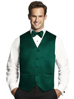 Men's Matte Satin Tuxedo Vest by After Six. Custom tuxedo vests in matte satin add formal elegance to your tuxedo. We've created these elegant men's formal accessories in our most popular colors so that each member of your wedding party will complement your wedding palette. All colors have a black lining, except ivory which has a matching ivory lining. Classic Green Groom's Tuxedo, Classic Satin Suits For Semi-formal Occasions, Elegant Green Vest For Formal Occasions, Elegant Green Formal Vest, Classic Green Tuxedo For Formal Occasions, Classic Green Tuxedo For Formal Events, Classic Green Formal Vest, Fitted Green Formal Vest, Classic Green Formal Tuxedo