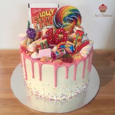 a birthday cake decorated with candy and candies