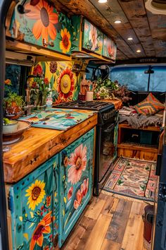 the interior of an rv decorated with sunflowers and other colorful decorating items