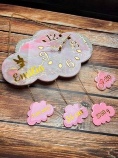 a wooden clock with pink and yellow flowers on it