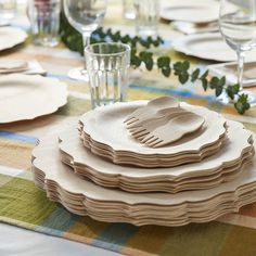 a stack of plates sitting on top of a table