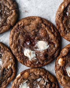 chocolate cookies with white butter on top