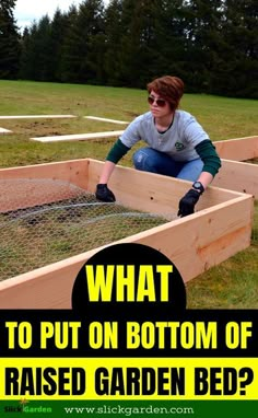 a woman kneeling down in a raised garden bed with text overlay that reads, what to put on bottom of raised garden bed?