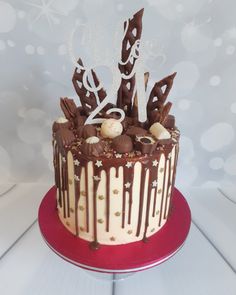 a birthday cake with chocolate and white frosting