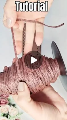 someone is holding a spool of thread with the words, how to make a spool