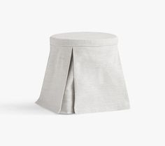 a white stool with a pleaed skirt on the front and back side, against a white background