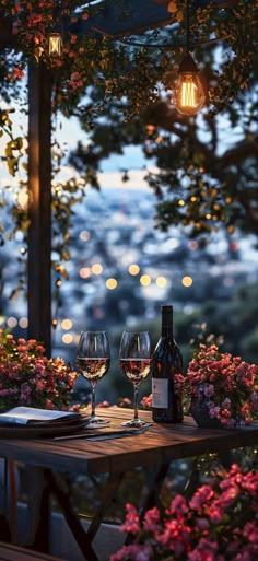 two wine glasses sitting on top of a wooden table