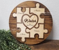 a personalized puzzle piece with the names of two people and a heart on it