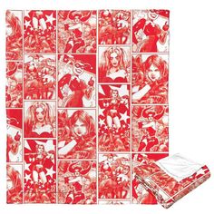 a red and white blanket with images of women in comics on the front, one is folded