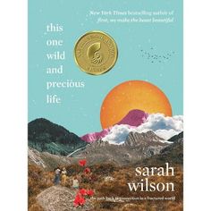 the cover of this wild and precious life by sarah wilson is shown in front of mountains