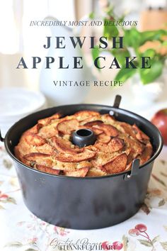 an apple cake in a pan on a table