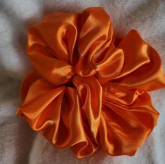 Who doesn't like BIG JUMBO scrunchy? This beautiful orange satin scrunchy is a must hair accessories for all type of events.  It is a statement! It is scrunchy-licious! You can wear for casual or special occasion. The soft satin feeling will leave your hair happy.  Size: Approximatively 5.5-6 inch Wrap approximatively X2 Orange Satin, Trendy Hairstyles, Hair Ties, Scrunchies, Elastic, Special Occasion, Satin, Hair Accessories, Orange