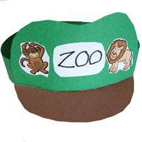 a green hat with pictures of animals and letters on the front, along with words that spell zoo