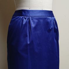 Talbots Petites Special Occasion Violet Satin Maxi Pencil Skirt W Pockets Labeled 2p, Modeled On A 4, See Measurements, Ask Questions. If This Is A True 2p, I Believe The Reason It Fits On Size 4 Dress Form Is Because It Was Designed To Be Worn Lower On The Hips Whereas, On The Dress Form, It Sits High On Waist. Nwt's From 2011, Suggest Dry Cleaning 1.5 Wide Waistband 13.5 Waist 17.5 Hips 36.5 Length 19 Back Kick Pleat Full Hand Deep Pockets, And This Suggests That Skirt Should Have Extra Room. Elegant Purple Satin Bottoms, Blue Pleated Skirt For Evening, Blue Fitted Satin Bottoms, Fitted Blue Satin Bottoms, Evening Blue Pleated Skirt, Blue Fitted Satin Skirt, Blue Satin Bottoms For Formal Occasions, Formal Blue Satin Bottoms, Blue Party Pencil Skirt With Lining