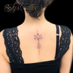 a woman with a tattoo on her back