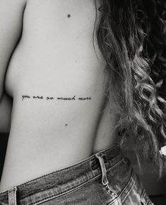 a woman's chest with the words you are so much more written on it