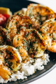 a plate with rice and shrimp on it