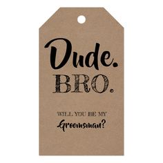 a brown tag that says dude bro will you be my groomsman?