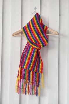 Add a bold splash of color to your wardrobe with this handcrafted rainbow scarf, symbolizing pride, love, and freedom! 🌈 Whether you're looking to express support for the LGBTQ+ community or simply add a vibrant accent to your outfit, this scarf is perfect for any occasion. Measuring 205 cm without the tassels (230 cm with tassels) and 23 cm wide, it wraps beautifully around your neck or shoulders, offering both comfort and style. Soft & Cozy: Made from premium acrylic yarn, it's lightweight ye Pride Scarf Crochet, Multicolor Knitted Acrylic Scarf, Vibrant Multicolor Scarves, Pride Love, Rainbow Scarf, Rainbow Pride, Shawls And Wraps, Acrylic Yarn, Everyday Look