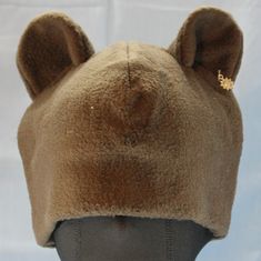 Ultrasoft fleece BEAR hat with round freestanding 3D bear ears and a solid base and ear lining in multiple colors.  This hat's cozy layers will keep you warm through the coldest days! Perfect for outdoor winter fun, a costume, or to make a statement. Will fit most adults. Multiple color variations are available so PLEASE specify which color style is preferred. If choosing the Custom Colors option, please reference the hat template image and write your color choices in the "Personalization" field Hat Template, Fleece Hat, Bear Hat, Bear Ears, Winter Fun, Polar Fleece, Multiple Color, Brown Bear, Color Style