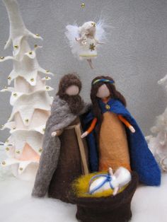 a nativity scene with figurines and decorations