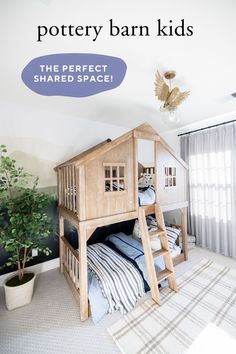 a wooden bunk bed sitting in the middle of a bedroom next to a potted plant