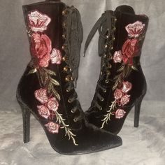 Size 6. Never Worn. Purchased From A Local Boutique. Gorgeous Black Velour Material With Intricate Floral Embroidery. Pointed Toe-Skinny Heel Boot. Vintage Lace Up Front. Embroidered Fitted High Heels, Embroidered High Heels, Floral Embroidered Fitted High Heels, Fitted Floral Embroidered High Heels, Embroidered Closed Toe Party Boots, Fall Embroidered High Heel Boots, Party High Heel Embroidered Boots, Black High Heels With Floral Embroidery, Black Heels With Floral Embroidery And Round Toe