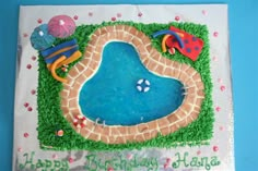 a birthday cake that is shaped like a pool