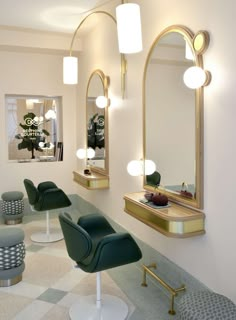 the interior of a salon with chairs, mirrors and stools in it's center