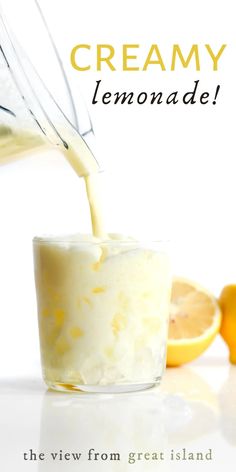 a glass filled with lemonade being poured into it