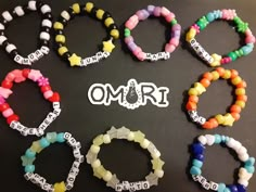 six different bracelets with the word omri written on them