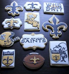 new orleans saints cookies are arranged on a table