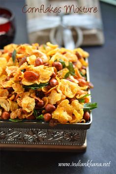 cornflakes mixture in a metal dish on a table