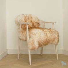 a chair that has some fur on it