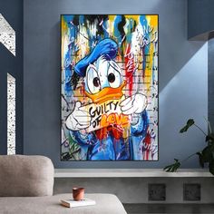 a living room with blue walls and a painting on the wall that says guilty ducky